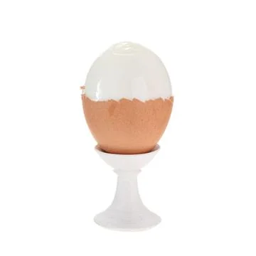 Cleaned egg on stand isolated on white background. Stock Photos