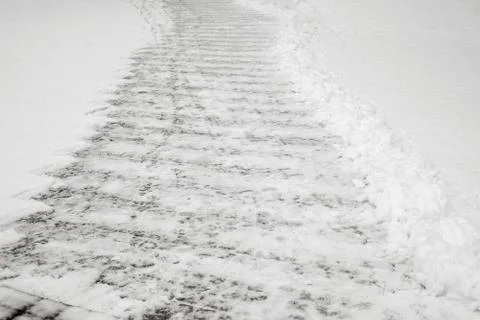 Cleaned sidewalk after a snow fall Foto stock