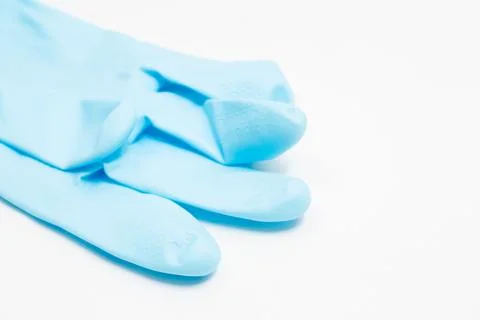 Cleaner concept, Light blue rubber gloves for cleaning isolated on white ba.. Stock Photos