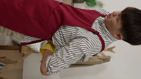 Cleaner man suffering backache and massaging Stock Footage 229618446