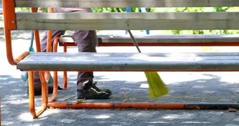The cleaner sweeping the park Stock Footage 303830880