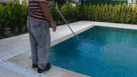 The cleaner who cleans the pool. The cleaner who cleans the pool floor. Stock Footage 145865467
