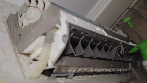 Cleaning of the air conditioner Stock Footage 118938631