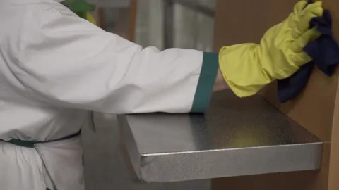 Cleaning and disinfection of surfaces. inside the airporte Stock Footage 146461541