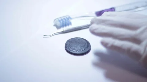 Cleaning antique Coins  Stock Footage 70519191