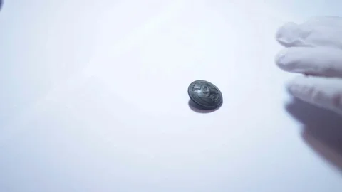 Cleaning antique Old Buttons Stock Footage 70519015