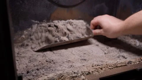 Cleaning ashes from a fireplace, close-up Stock Footage 323864422