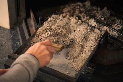 Cleaning ashes in the fireplace Photos