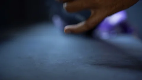 Cleaning back of desktop keyboard with cloth 4k Stock Footage 121704937