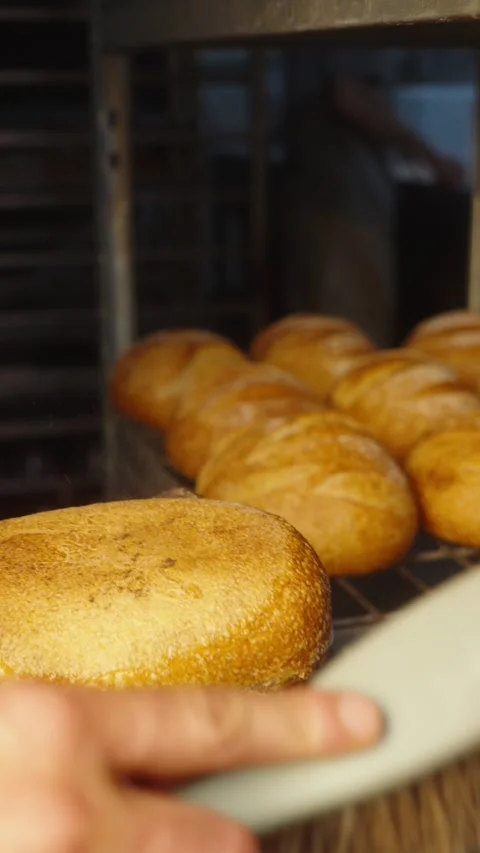 Cleaning Baked Bread with Bakery Brush Stock Footage 345878671