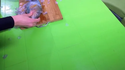 Cleaning of barracuda fish. Stock Footage 76786919