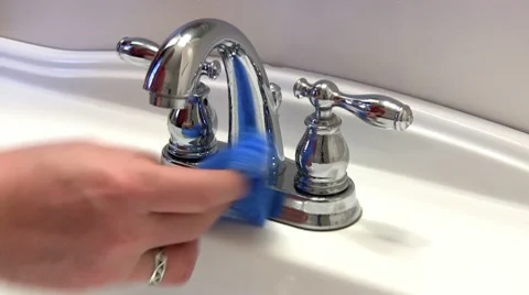 Cleaning bathroom sink Stock Footage 10774600