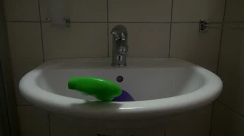 Cleaning bathroom sink Stock Footage 20461126