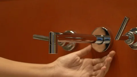 Cleaning the bathroom tap Stock-Footage 128546218