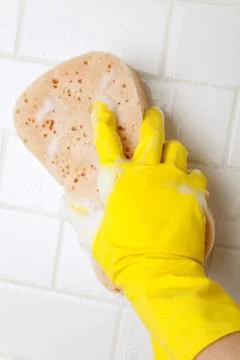 Cleaning Bathroom Tile Wall Stock Photos