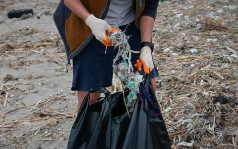 Cleaning the beach, making a difference Stock Photos