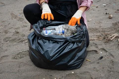 Cleaning the beach, making a difference Stock Photos