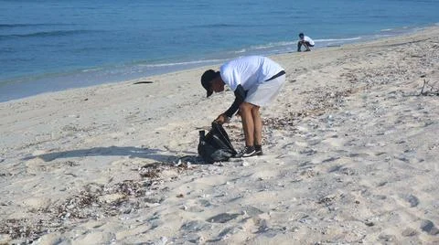 Cleaning the beach Stock Photos