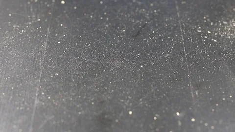 Cleaning the black table with liquid and a paper towel. Keeping the house clean. Stock Footage 101353473