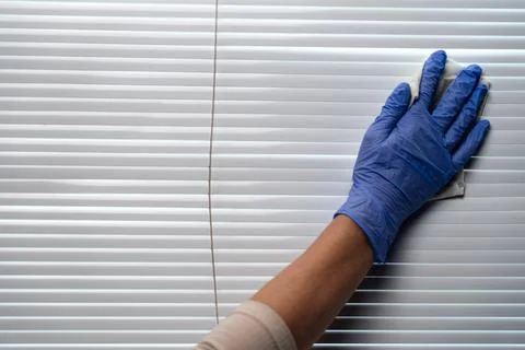 Cleaning blinds. Fotos de archivo