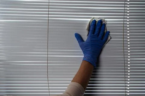 Cleaning blinds. Fotos de archivo