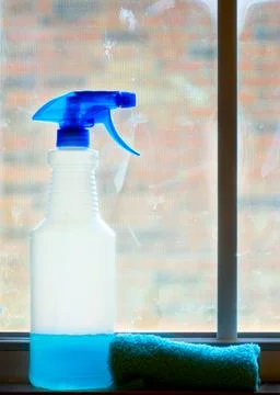 Cleaning bottle rag blue Stockfoto's