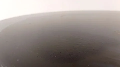 Cleaning the brown table with the tissue Stock Footage 150665897