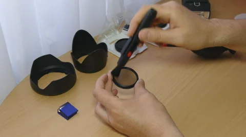 Cleaning Camera Filters Stock Footage 55531497