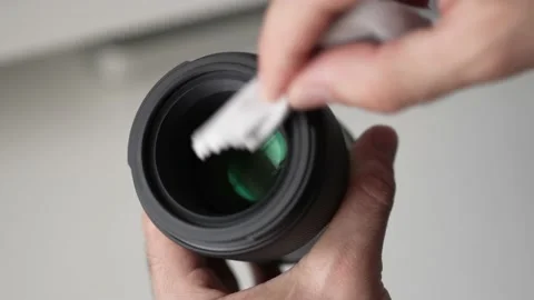 Cleaning a Camera Lens With a Microfiber Cloth Closeup Stock Footage 209366283