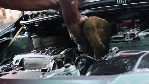 Cleaning car engine and open hood. Stock Footage 83768541