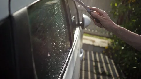 Cleaning car glass Stock Footage 100897113