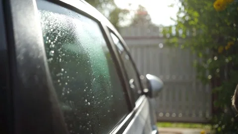 Cleaning car glass Stock Footage 100897172