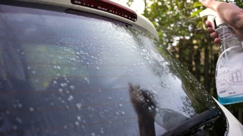 Cleaning car glass Stock Footage 100897268