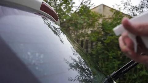 Cleaning car glass Stock Footage 100897285