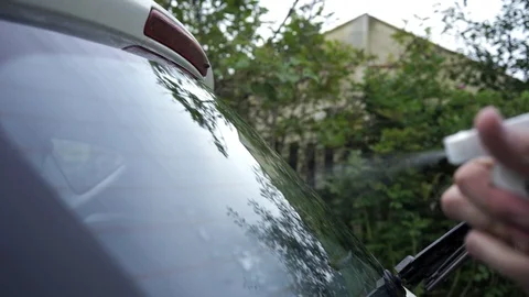 Cleaning car glass Stock Footage 100897316