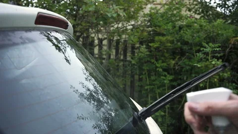 Cleaning car glass Stock Footage 100897345