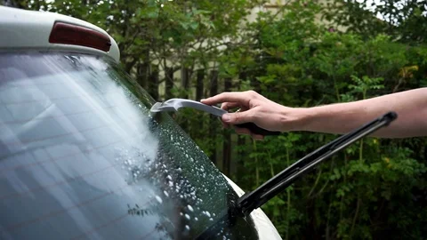Cleaning car glass Stock Footage 100897414