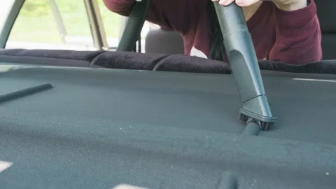 Cleaning the car interior from dust Stock Footage 132585664