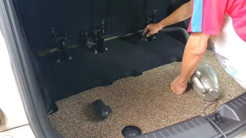 Cleaning car interior with a vacuum cleaner, removing dust and dirt from se.. Stock Footage 301062777