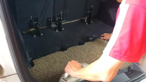 Cleaning car interior with a vacuum cleaner, removing dust and dirt from se.. 스톡 동영상 301062968