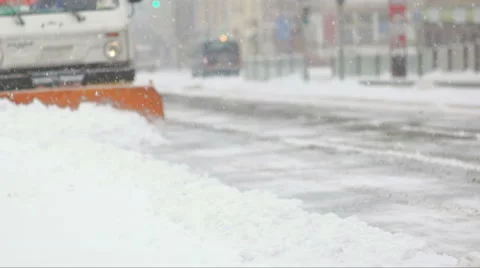Cleaning car plowing snow to side of the street Stock Footage 59644553