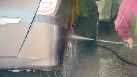 Cleaning Car Using High Pressure Water. Stock Footage 106109400