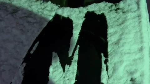 Cleaning the car windshield from snow Stock Footage 166474801