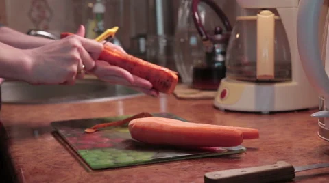 Cleaning carrot, knife Stock Footage 61492310