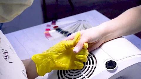 Cleaning the client's nails from nail dust. Stock Footage 131980976