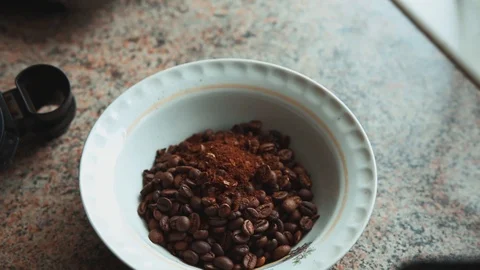 Cleaning the coffee maker's grinding unit. Stock Footage 104153955