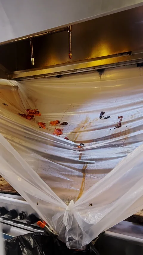 Cleaning commercial kitchen hood in the kitchen. Stock Footage 307487531