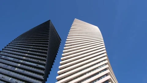A cleaning company performs work on a skyscraper. Employees are cleaning th.. Stock Footage 262958385
