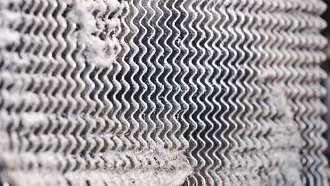 Cleaning a computer radiator to improve performance and reduce overheating 動画素材 304520285
