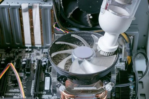 Cleaning the cooling system on a desktop computer Foto stock